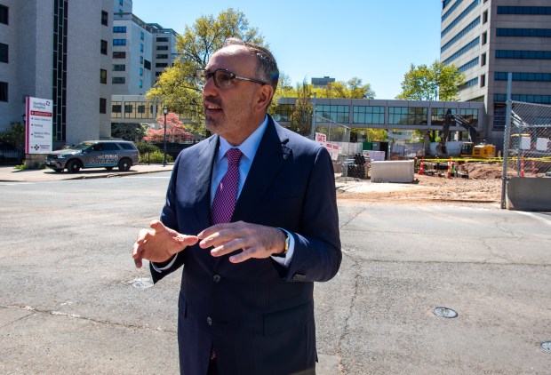 Jeff Flaks, president and CEO of Hartford HealthCare, discusses the hospital's expansion during a tour of the Hartford campus on Friday, April 24, 2026. (Aaron Flaum/Hartford Courant)