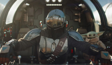 (L-R) Mandalorian (Pedro Pascal) and Grogu in Lucasfilm's The Mandalorian and Grogu