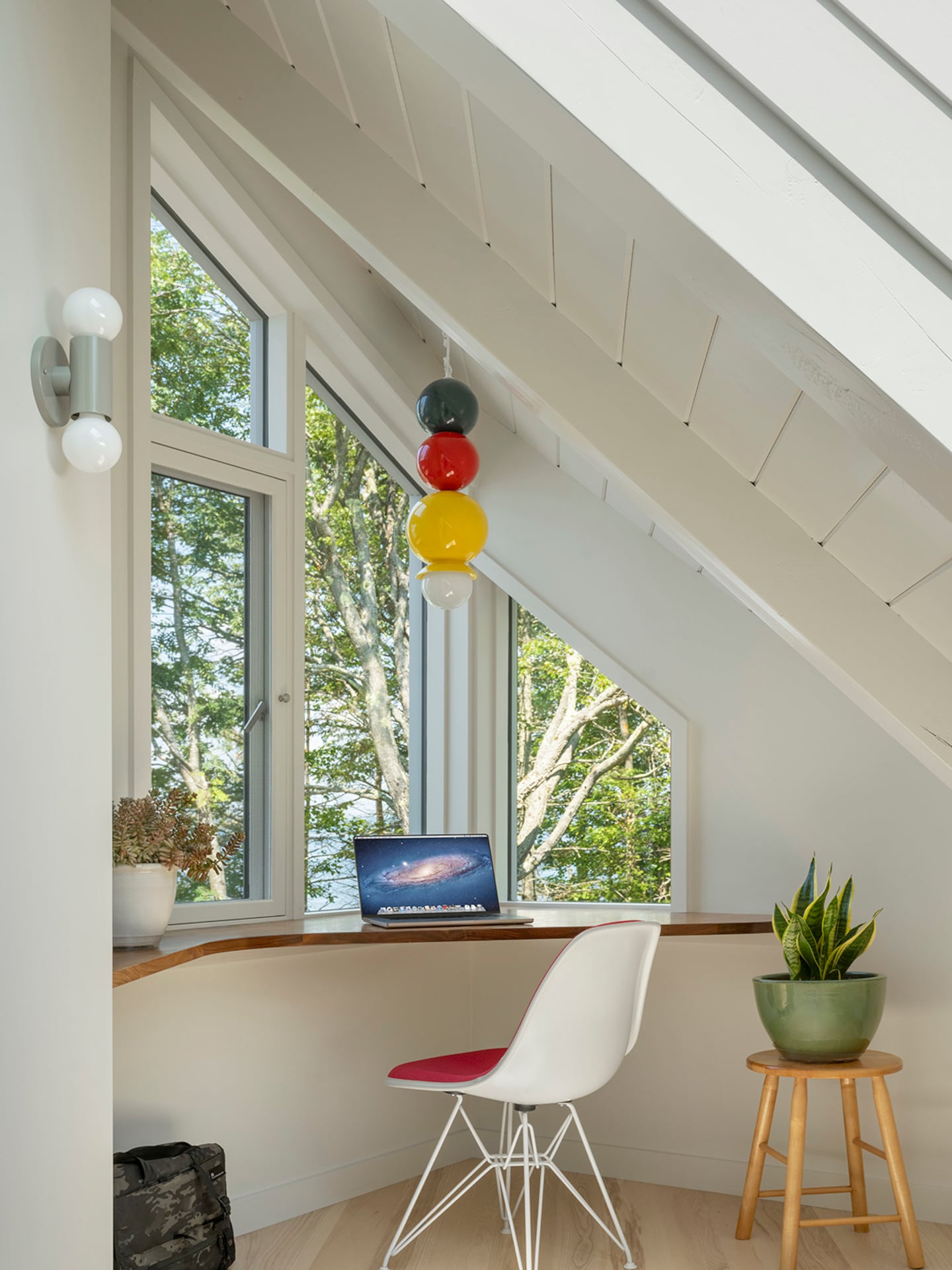 Homeowner Elizabeth Grob hung a J Schatz pendant over her desk, which overlooks the bay, as a tribute to her dad.