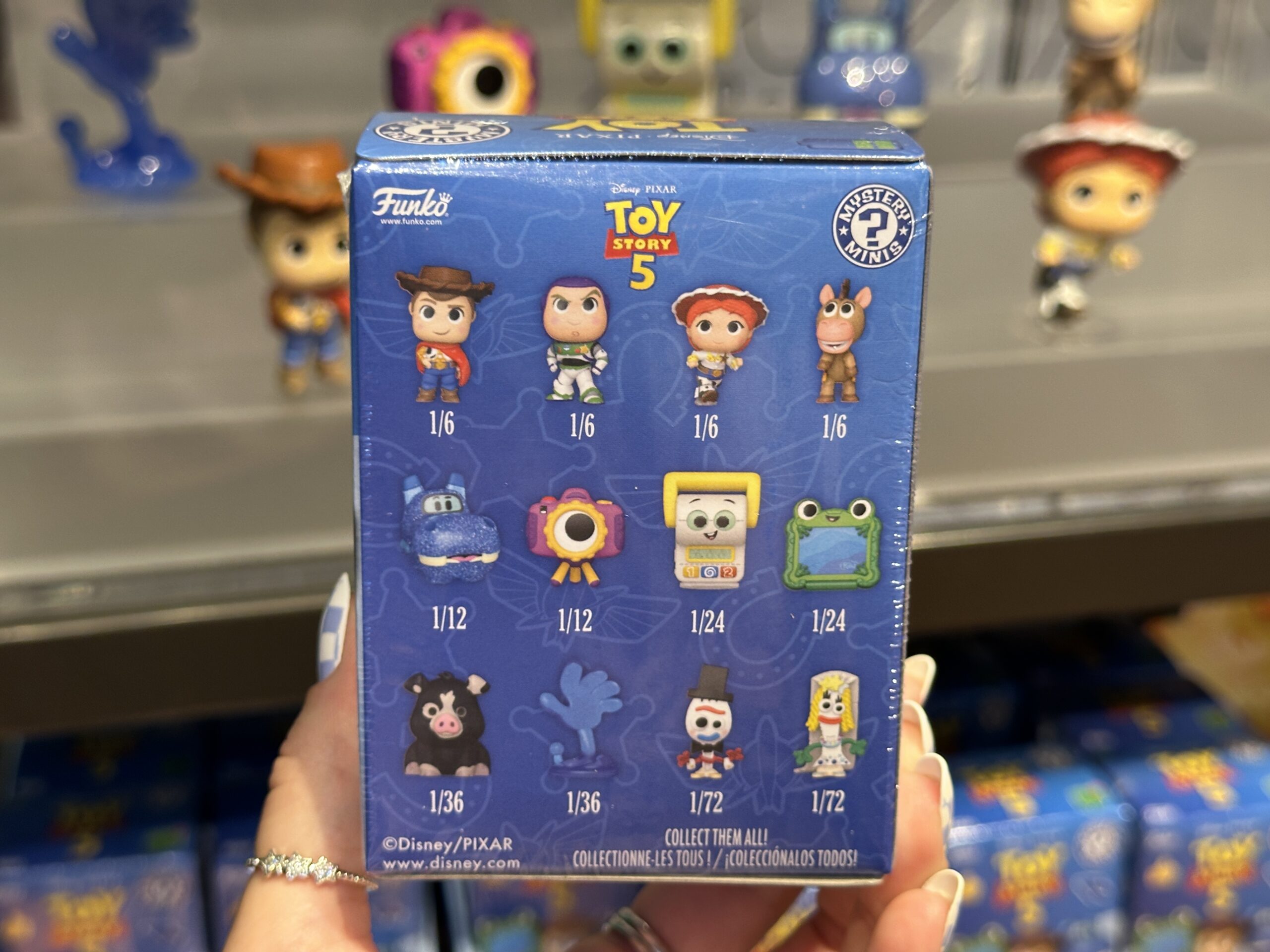 New mystery box collection featuring Toy Story 5 at Disney Springs