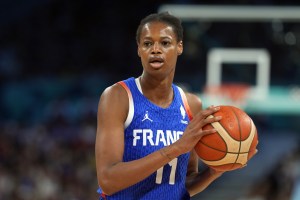 Aug 4, 2024; Villeneuve-d'Ascq, France; France small forward Valeriane Ayayi (11) controls the ball against Australia in the first half in a women’s group B game during the Paris 2024 Olympic Summer Games at Stade Pierre-Mauroy. Mandatory Credit: John David Mercer-USA TODAY Sports