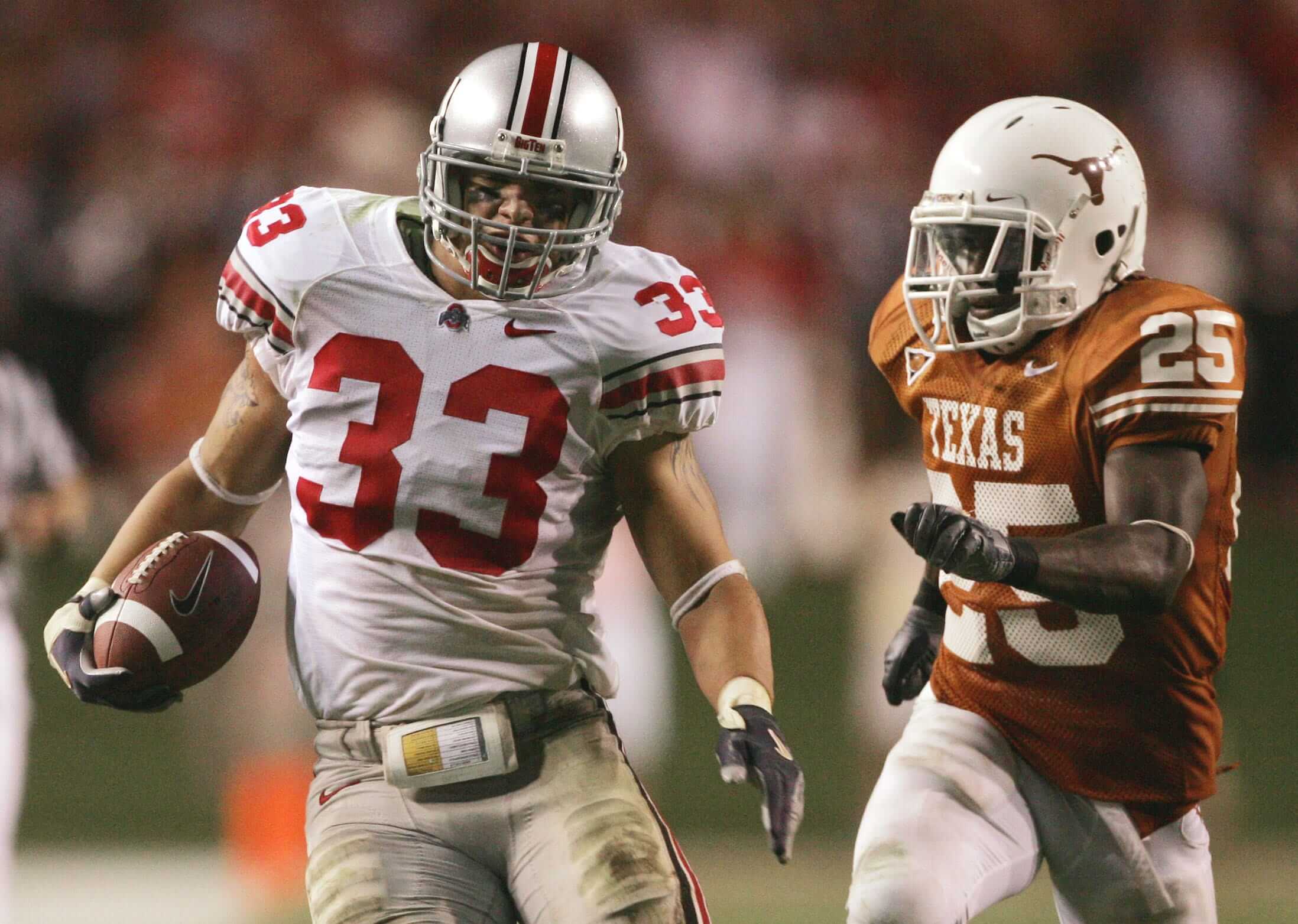 James Laurinaitis runs with the football after an interception.