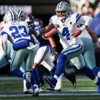 Jan 4, 2026; East Rutherford, New Jersey, USA; Dallas Cowboys quarterback Dak Prescott (4) hands the ball off to Dallas Cowboys running back Jaydon Blue (23) during the second quarter against the New York Giants at MetLife Stadium.