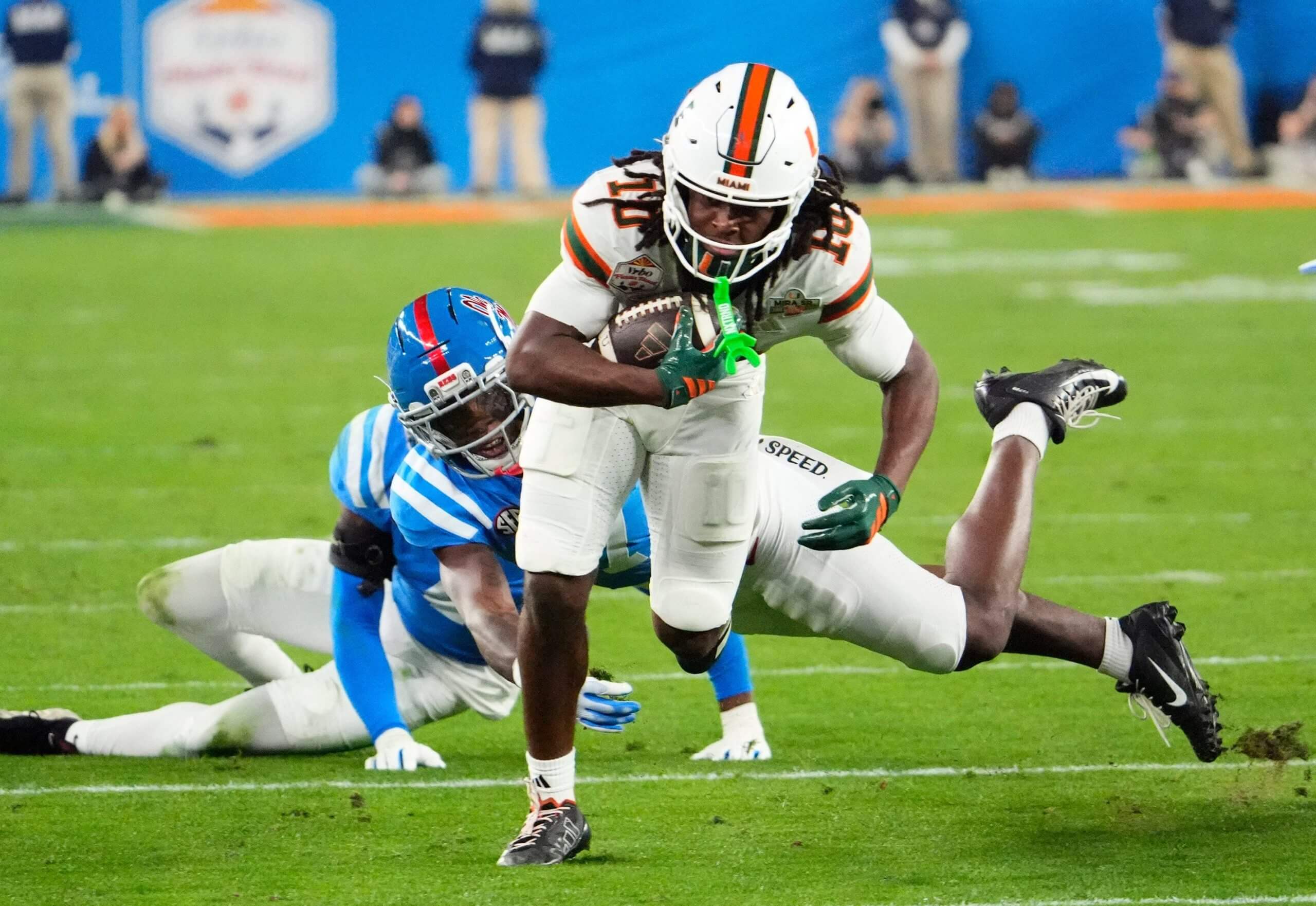 Malachi Toney runs with the ball.