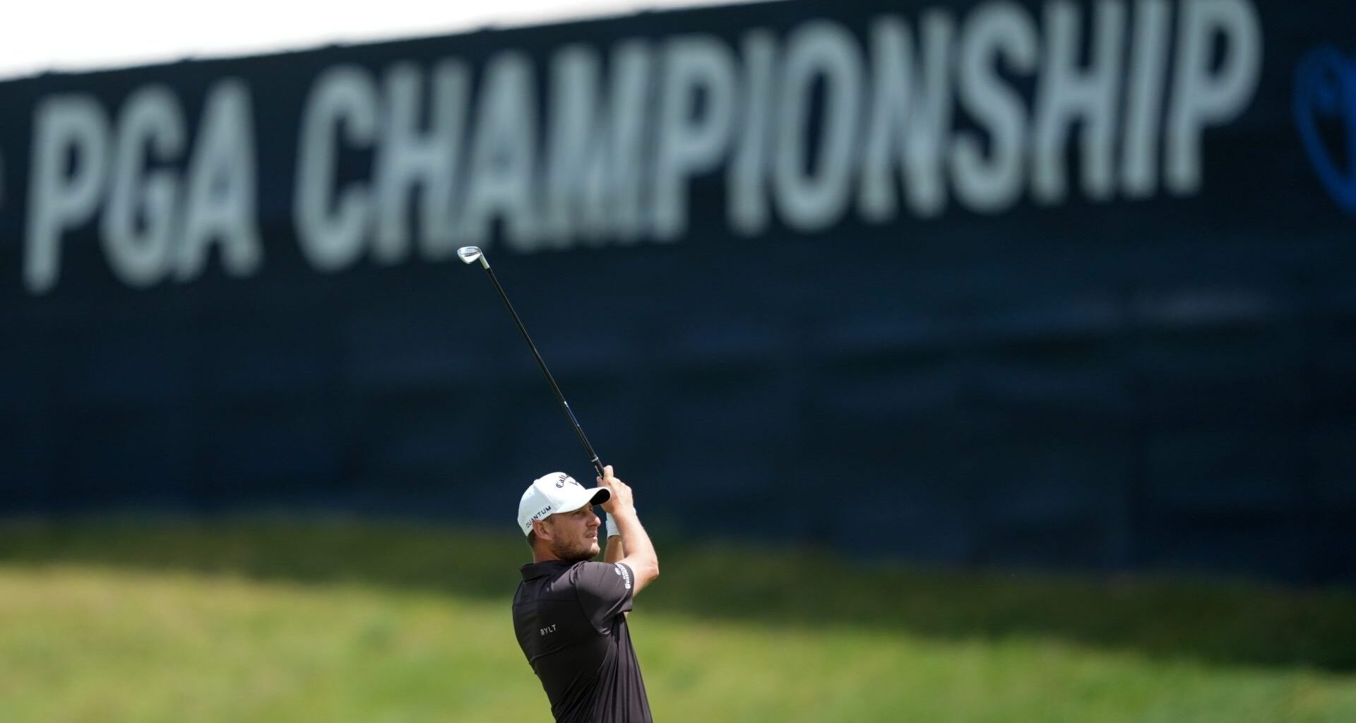 May 14, 2026; Newtown Square, Pennsylvania, USA; Emiliano Grillo plays his shot on the tenth hole during the first round of the PGA Championship golf tournament at Aronimink Golf Club. Mandatory Credit: James Lang-Imagn Images