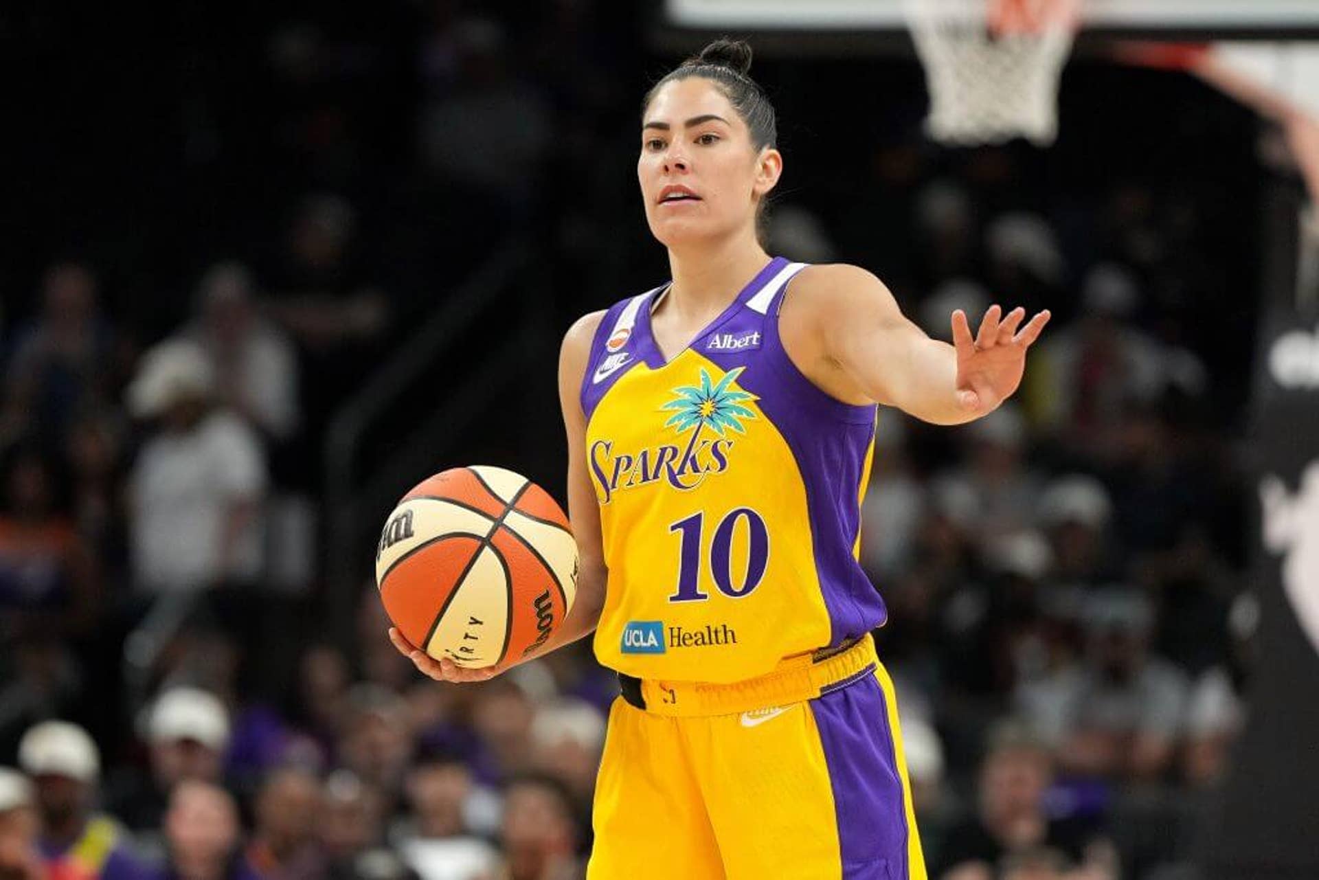 Los Angeles Sparks guard Kelsey Plum calls out the play in a game.