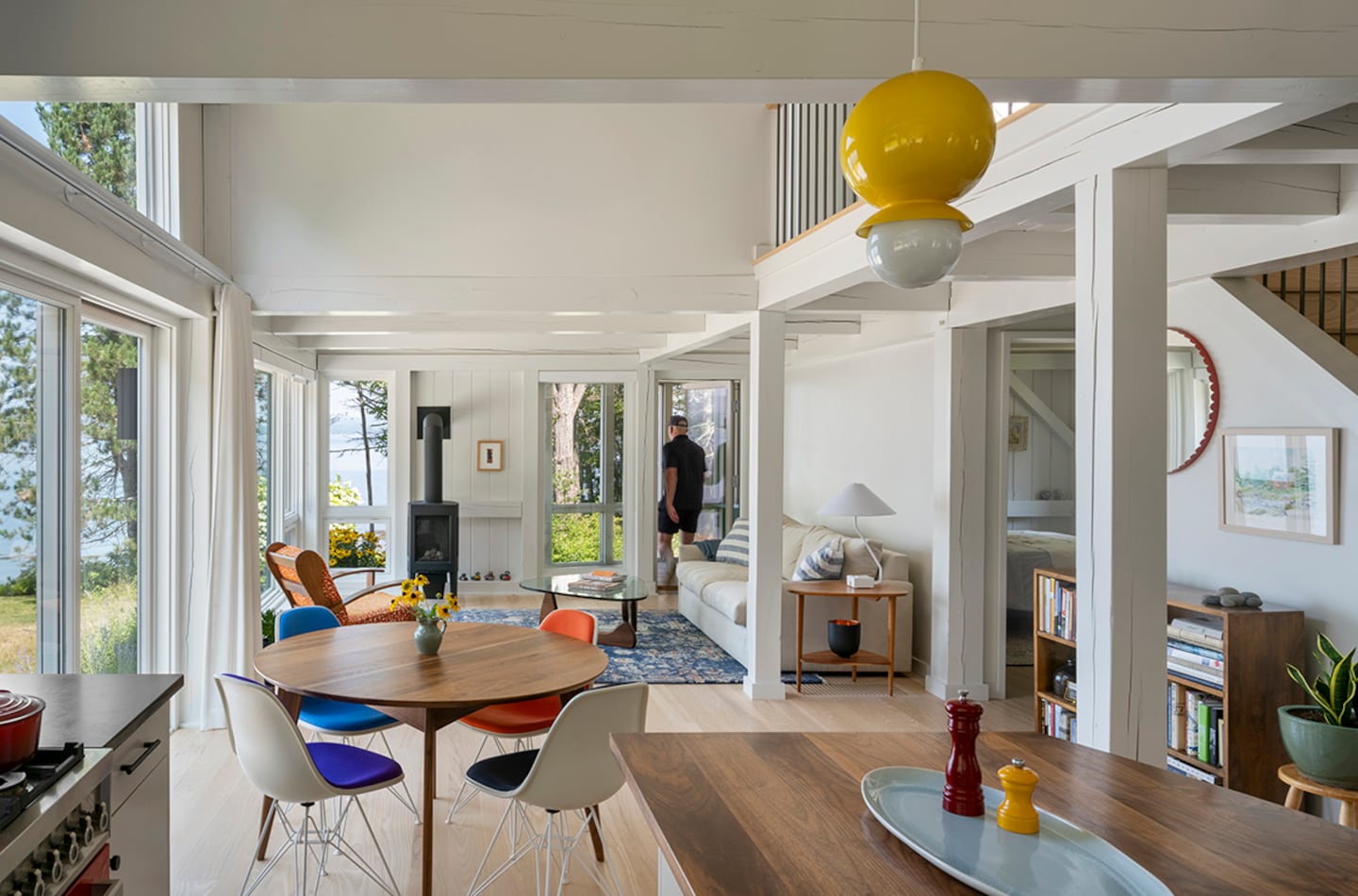 Unable to decide on just one color for the Herman Miller dining chairs, Grob asked Morris what he thought about doing each one in a different color; he was all in.