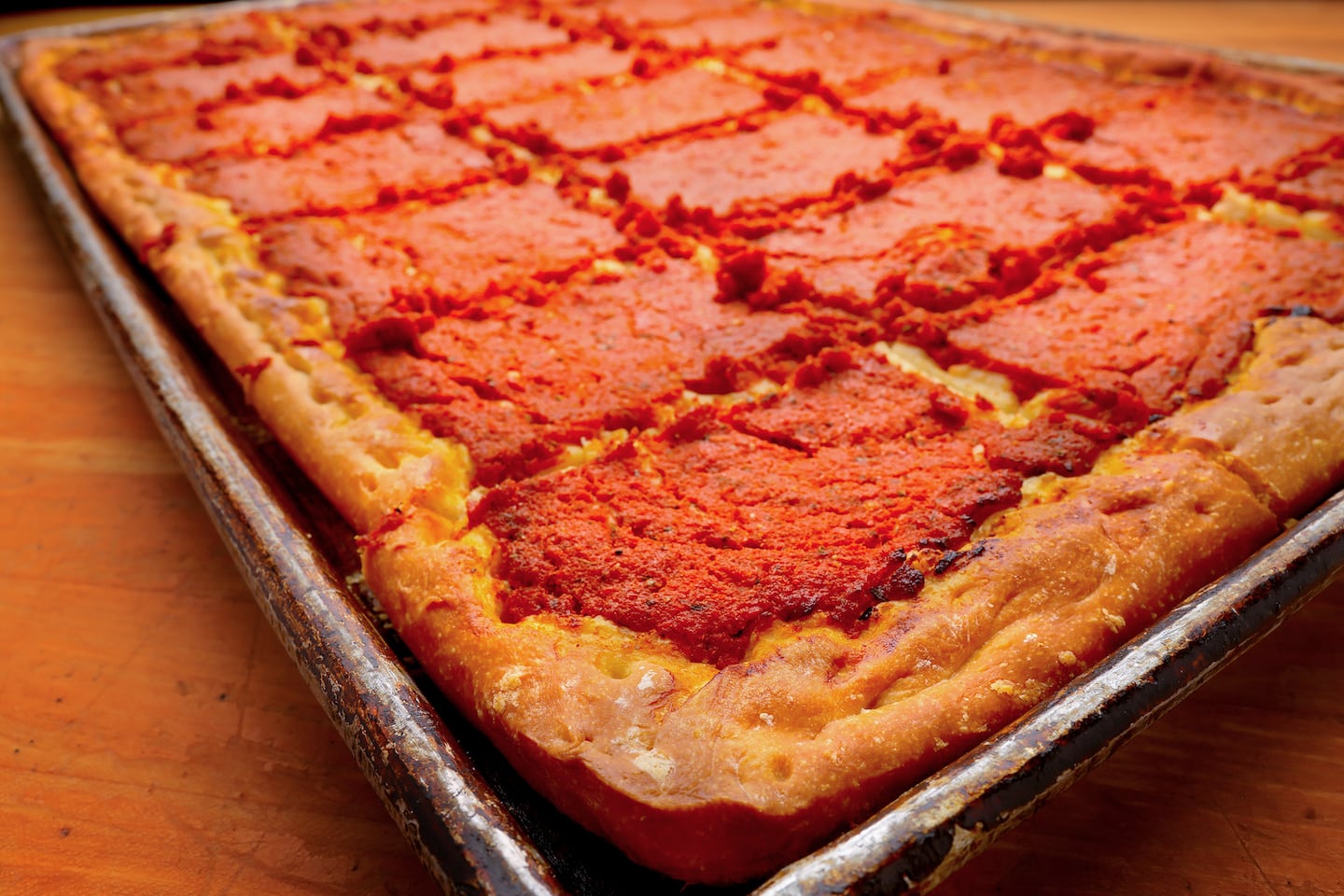 A tray of traditional Rhode Island-style pizza, sans cheese, at LaSalle Bakery in Providence.