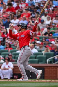 Red Sox first baseman Willson Contreras hits a two-run home run against the St. Louis Cardinals during the first inning at Busch Stadium.