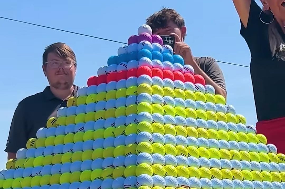 Watch: World's largest golf ball pyramid constructed on Texas course