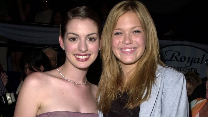 Anne Hathaway & Mandy Moore during The Princess Diaries Premiere After Party at El Capitan Theatre in Hollywood, California.