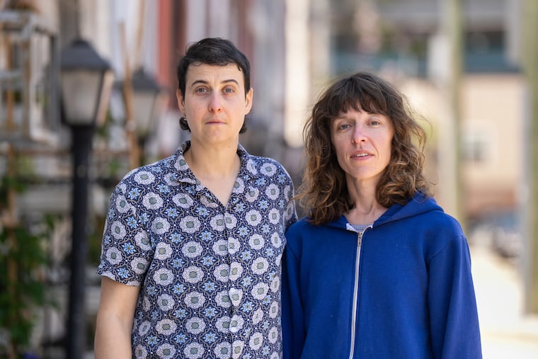 Elizabeth Shapiro (left) and her partner Christina Gesualdi at their home in Philadelphia. They had relied on the Council for Relationships for low-fee couples therapy and learned it was closing at their regular session last week.