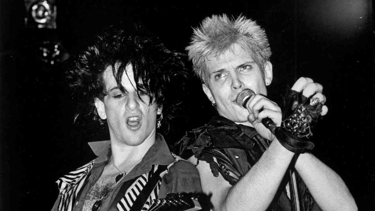 Billy Idol and guitarist Steve Stevens performing onstage in the 1980s