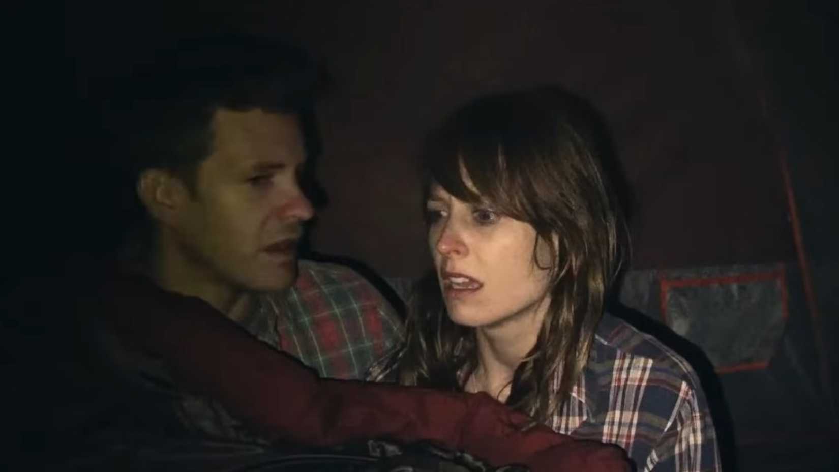 A terrified couple in a tent as something walks around outside in Willow Creek