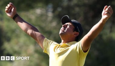 South Africa's Yurav Premlall holds his arms aloft in celebration