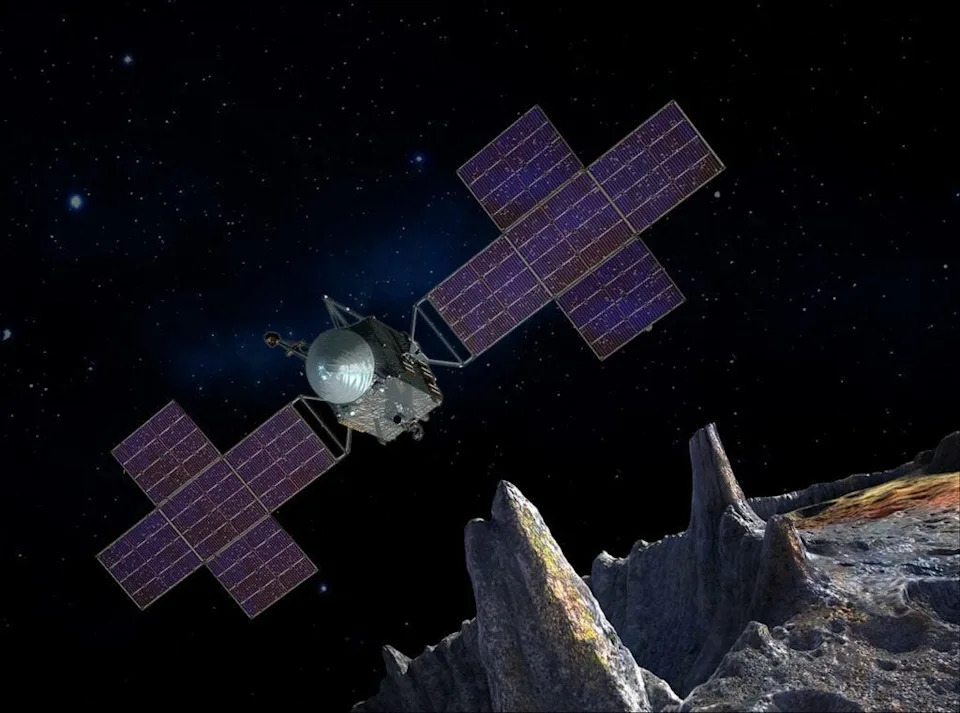 Artist's concept illustration depicting the spacecraft of NASA's Psyche mission near the targeted metal asteroid Psyche.