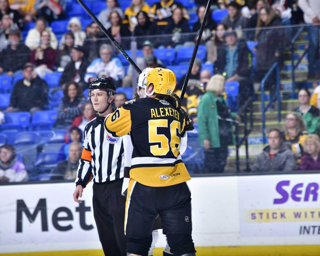 Alex Alexeyev and Bogdan Trineyev in a scrum during the 2026 Calder Cup Playoffs