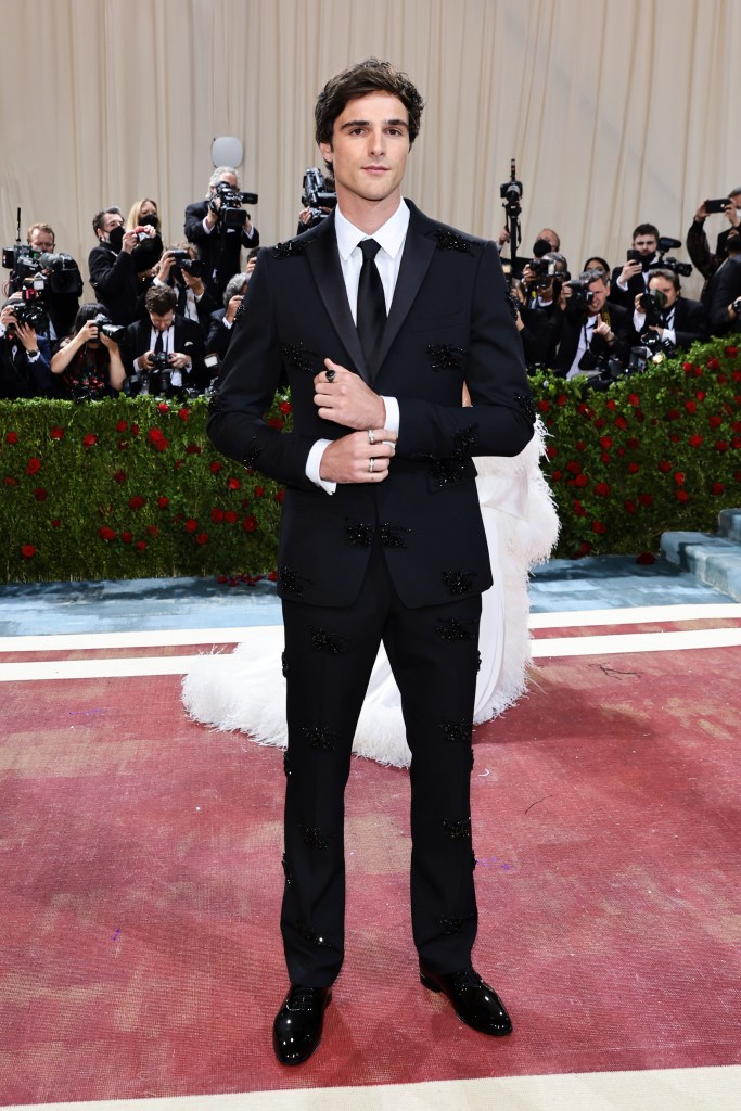 Jacob Elordi attends the 2022 Met Gala in a black suit with embellished details.