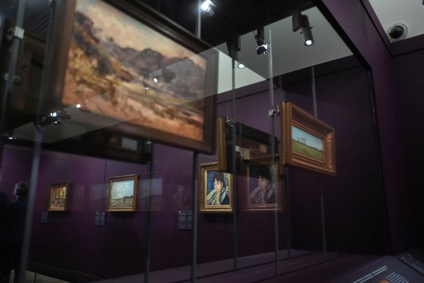 There are currently 12 paintings and a sculpture on display but these will be rotated from the musem's collection of 225 pieces whose ownership is not clear.