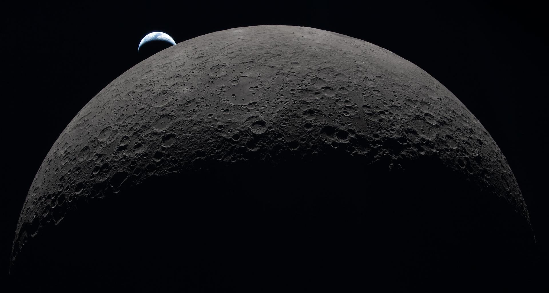 Picture from Artemis II, Earth in the distance behind the moon.