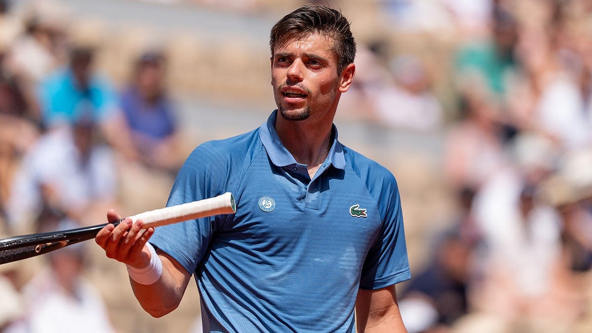 Arthur Gea reacting during a tennis match at the French Open in Paris