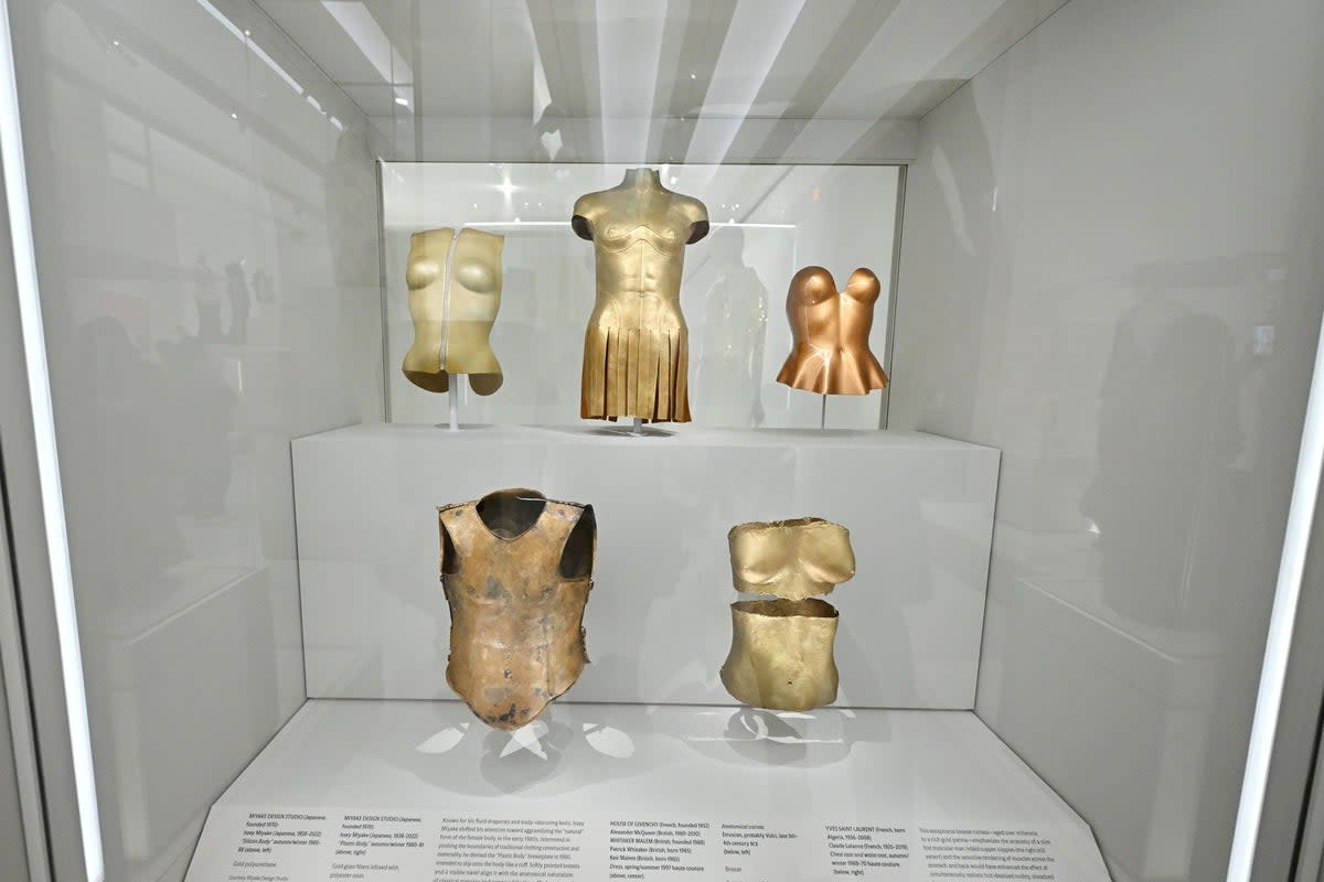At the ‘Costume Art’ exhibit, Each garment at the exhibit is paired with an ancient artefact that represents the historical depictions of the feminine body, such as statues of Greek goddesses on pedestals and medieval busts (Getty Images)
