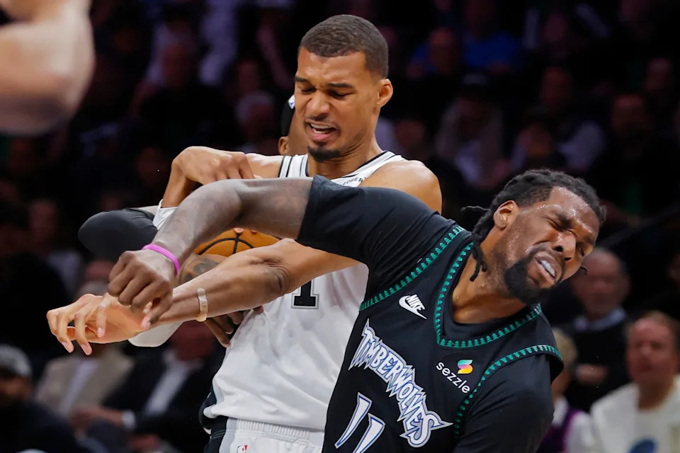 Victor Wembanyama commits a Flagrant 2 foul on Naz Reid during Game 4 at Target Center.