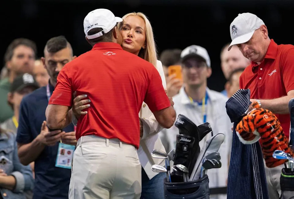 Tiger Woods of Jupiter Links GC gets a hug and kiss from Vanessa Trump before match against Los Angeles Golf Club during the TGL finals at SoFi Center on March 24, 2026, in Palm Beach Gardens, Florida. GREG LOVETT/PALM BEACH POST / USA TODAY NETWORK via Imagn Images