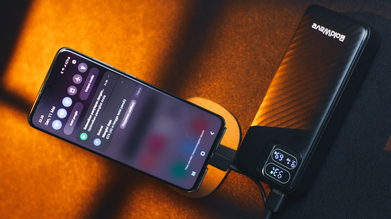 a Samsung phone charging off a power bank