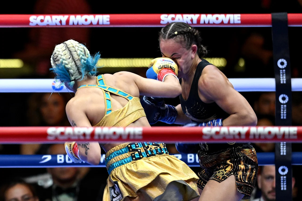 CAIRO, EGYPT - MAY 23: Mizuki Hiruta punches Mai Soliman during the Women's WBO World Super Flyweight Title fight between Mizuki Hiruta and Mai Soliman as part of the Glory in Giza Fight Night at Pyramids Panorama 2 on May 23, 2026 in Cairo, Egypt. (Photo by Mohamed Hossam/Getty Images)