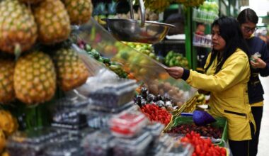 Colombia 12-month inflation edges up in April