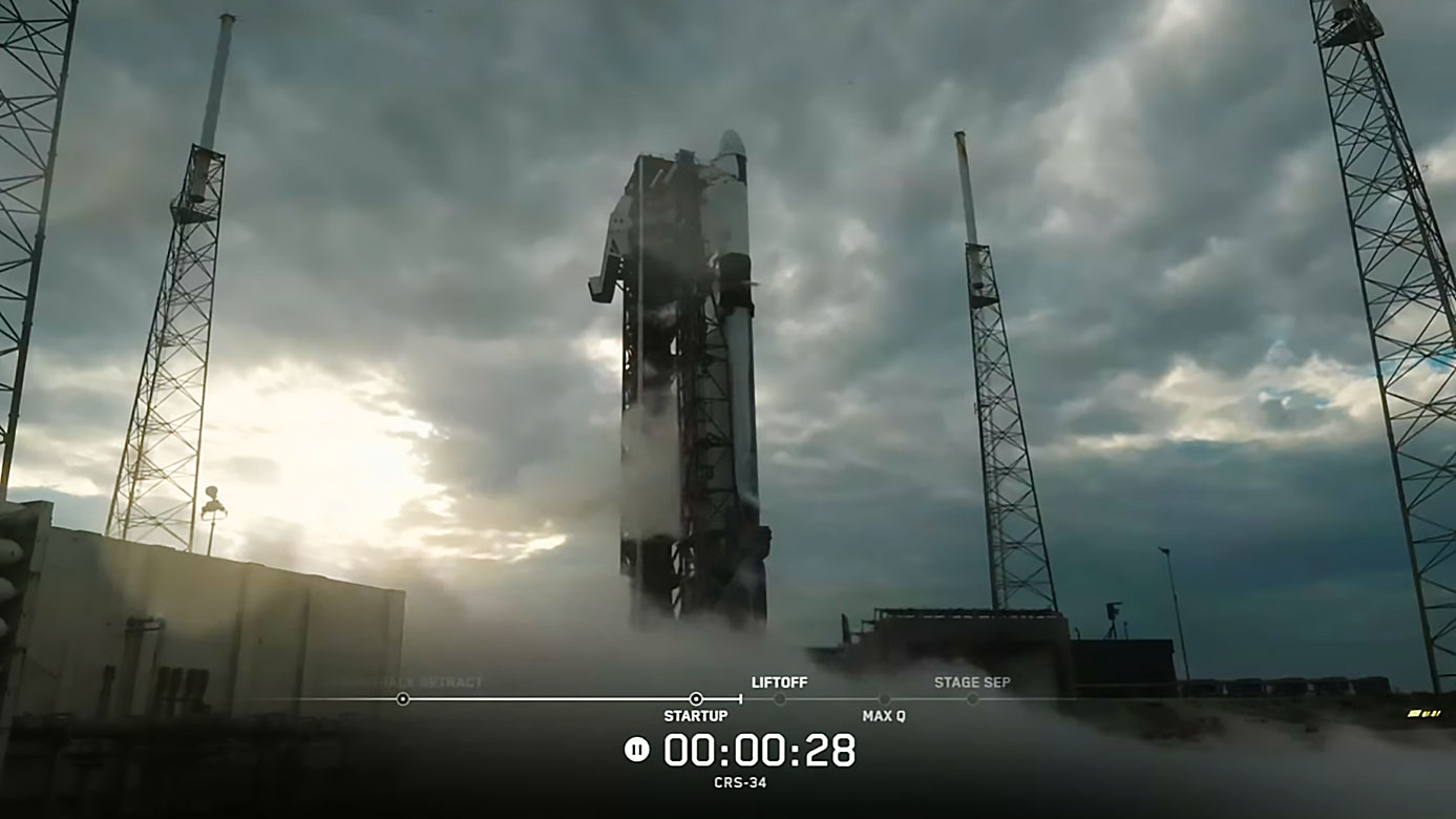 The SpaceX Falcon 9 rocket with a Dragon cargo spacecraft atop stands at its launch pad at Space Launch Complex 40 at Cape Canaveral Space Force Station in Florida moments after mission teams stood down from Wednesday's launch opportunity.