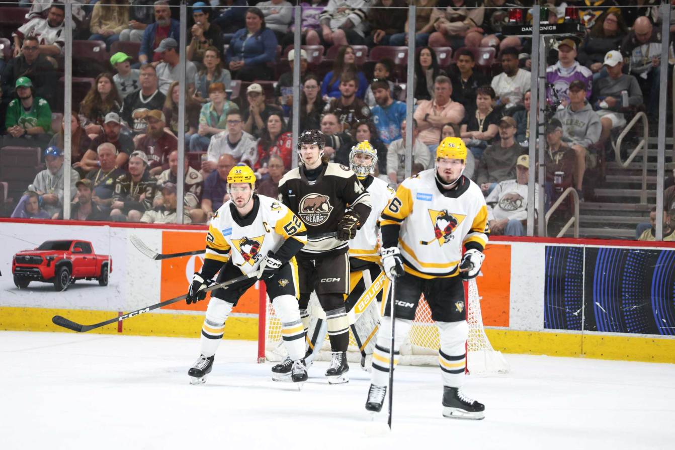 Bogdan Trineyev sets up in front of the net with Alex Alexeyev on the ice