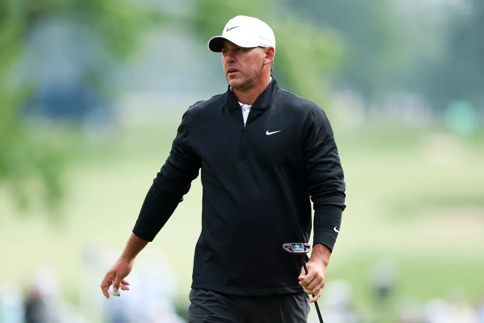 Brooks Koepka of the United States looks on from the 12th green during the first round of the PGA Championship at Aronimink Golf Club on May 14, 2026 in Newtown, Pennsylvania.