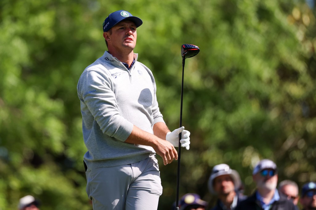 Bryson DeChambeau plays his shot from the fifth tee during the first round of the Masters Tournament at Augusta National Golf Club.