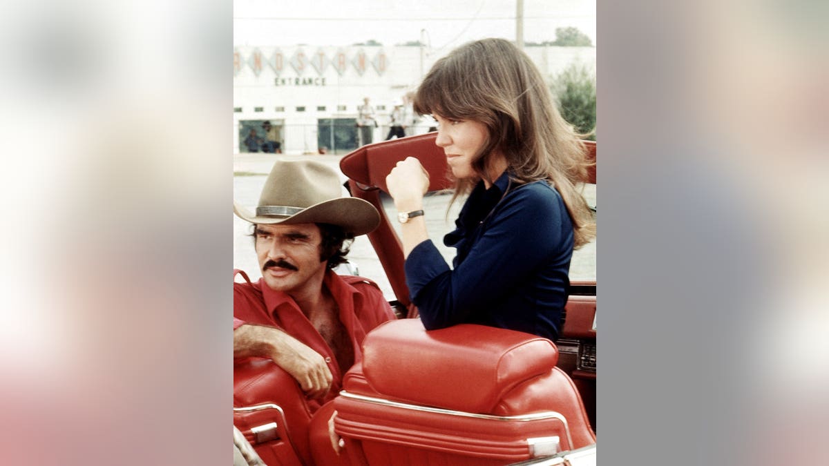 Burt Reynolds and Sally Field driving a Cadillac Eldorado in Smokey and the Bandit