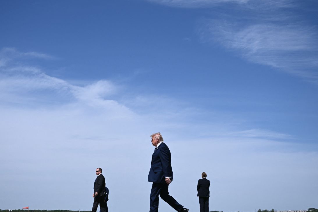 President Donald Trump walks as he arrives at Morristown Airport in New Jersey on May 22.