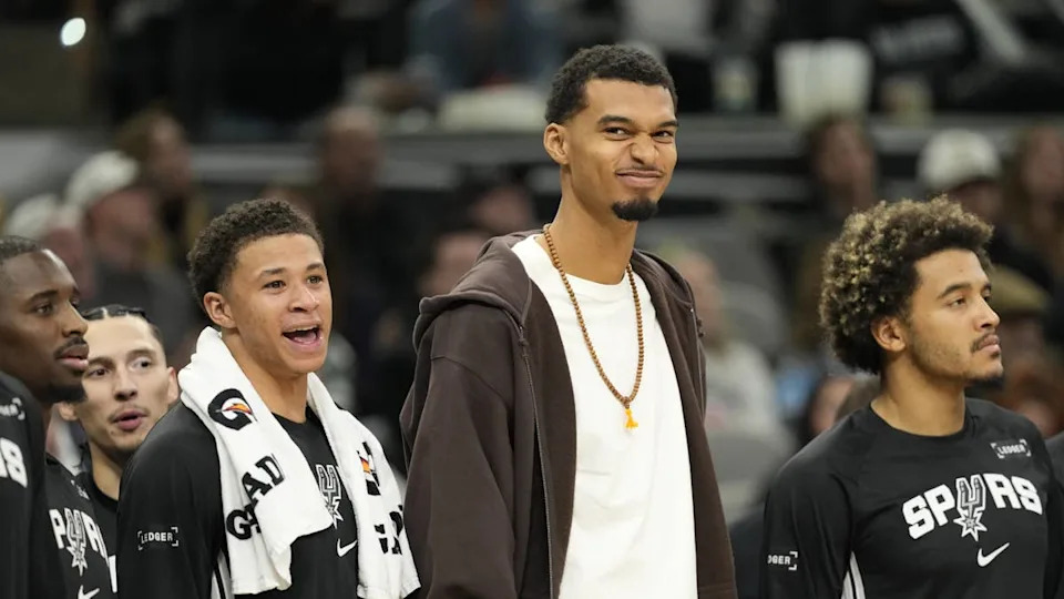 Dec 2, 2025; San Antonio, Texas, USA; San Antonio Spurs forward Victor Wembanyama (1) along with forward Carter Bryant (11) react from the bench during the second half against the <a class="link " href="https://sports.yahoo.com/nba/teams/memphis/" data-i13n="sec:content-canvas;subsec:anchor_text;elm:context_link" data-ylk="slk:Memphis Grizzlies;sec:content-canvas;subsec:anchor_text;elm:context_link;itc:0" data-yga="{"yLinkElement":"context_link","yModuleName":"content-canvas","yLinkText":"Memphis Grizzlies","ySubModuleName":"anchor_text","yHasCommerce":false}">Memphis Grizzlies</a> at Frost Bank Center. Mandatory Credit: Scott Wachter-Imagn Images