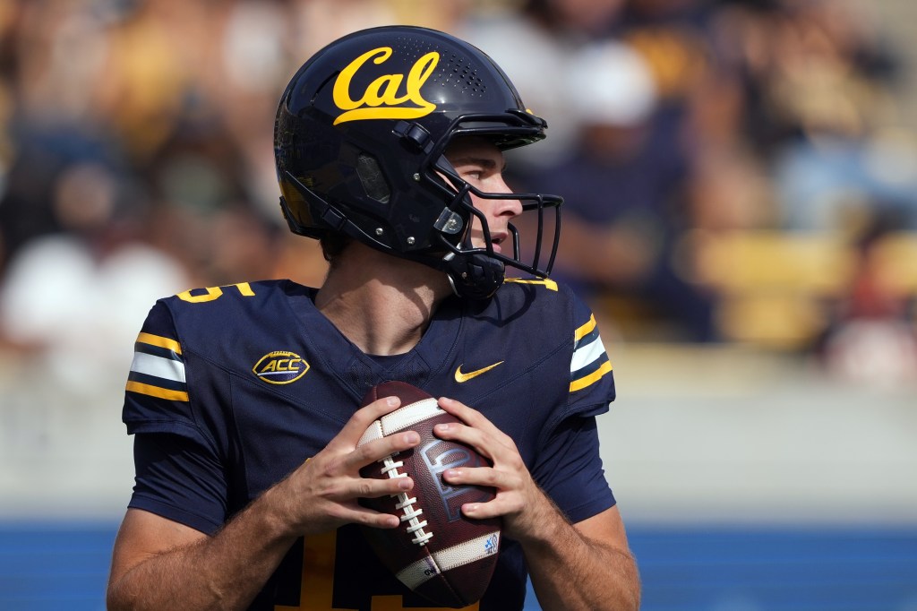 California Golden Bears quarterback Fernando Mendoza holding a football.
