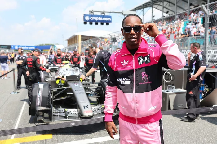 Cam'ron with the Audi F1 Team R26 on the grid.