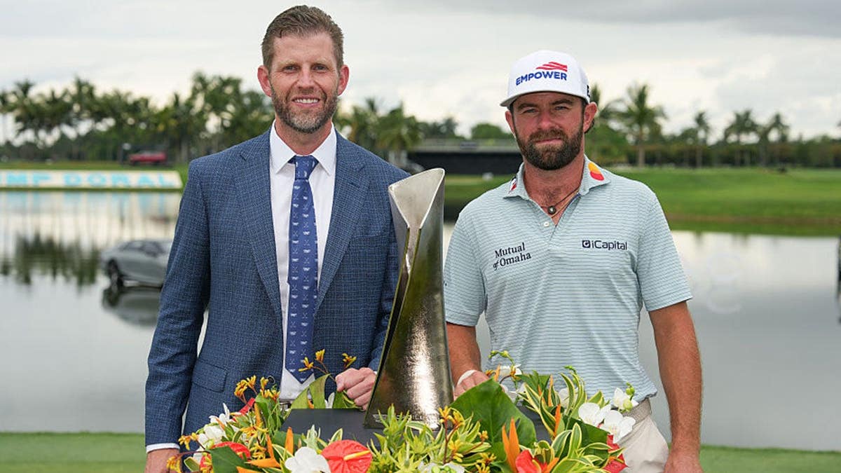 Cameron Young and Eric Trump