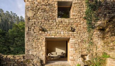 vernacular stone cabin in northern spain gains a renewed layered inner envelope