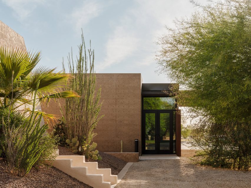 Building with pigmented cast-concrete walls that echo the hues of the surrounding landscape