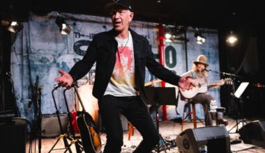 John McEnroe storms the stage during Linda Perry's show