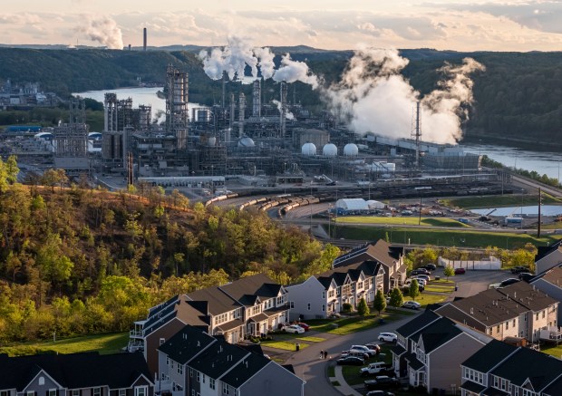 The Shell Polymers Monaca petrochemicals complex operates below a residential community along the Ohio River, April 30, 2026, in Beaver County, Pennsylvania. (Brian Cassella/Chicago Tribune)