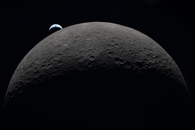 Earth sets over the Moon’s curved limb in this photo captured by the Artemis II crew fly-by mission.