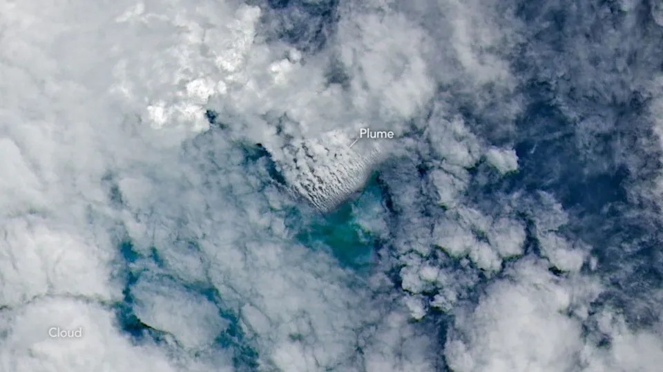Closely spaced volcanic plumes, surrounded by clouds, stream from a growing underwater volcanic platform in this natural-color image captured by the OLI (Operational Land Imager) on Landsat 9 on May 11, 2026, three days after the eruption began.
