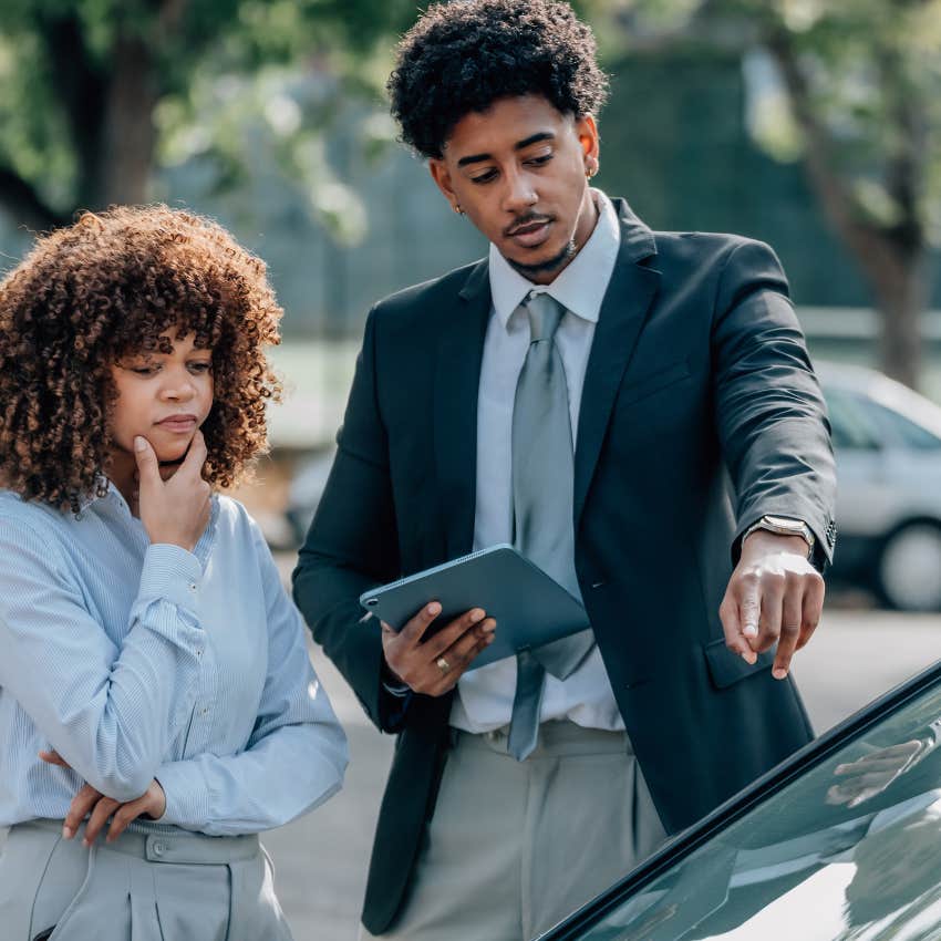 middle-class woman shopping for a used car