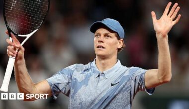 Jannik Sinner celebrates after first-round French Open win