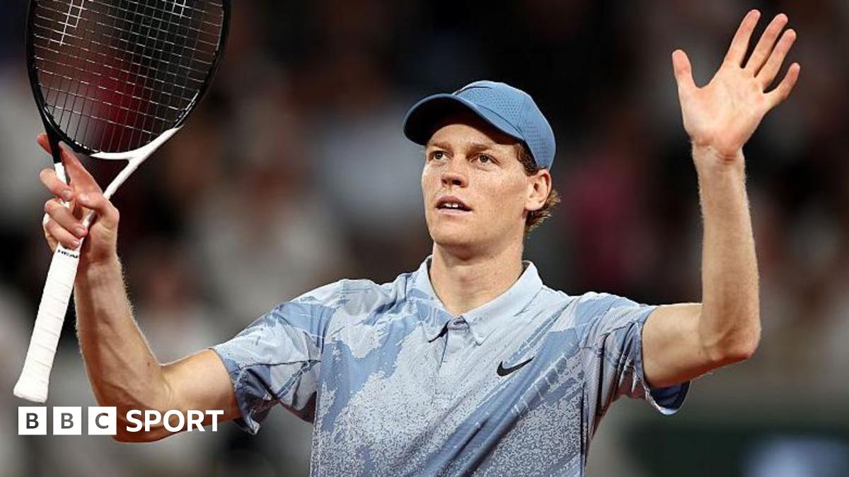 Jannik Sinner celebrates after first-round French Open win